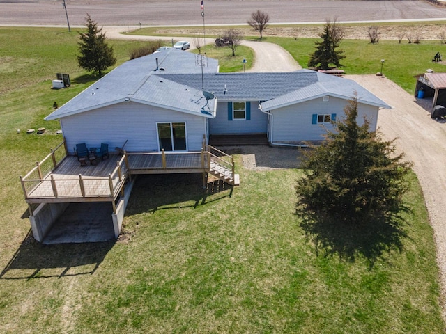 2956 Welland Rd, Earlville, IL 60518 - back of property featuring a deck and a lawn