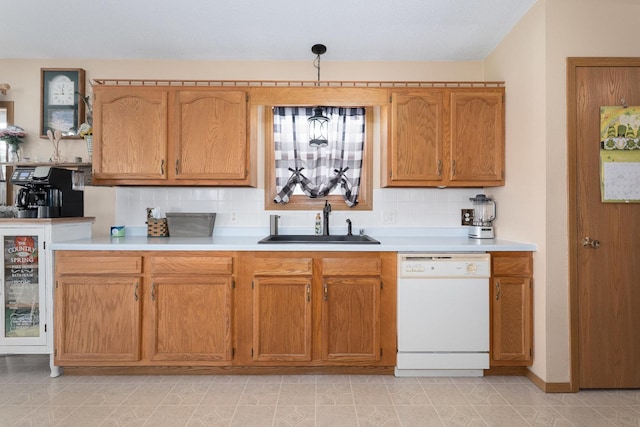 2956 Welland Rd, Earlville, IL 60518 - kitchen with a sink, light countertops, tasteful backsplash, and dishwasher