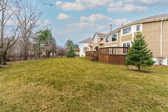 view of yard featuring a deck