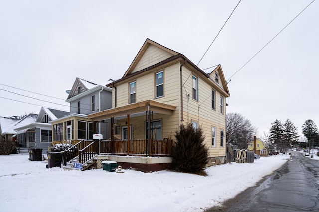 1243 S Float Ave, Freeport, IL 61032 - view of front of home with covered porch and a sunroom