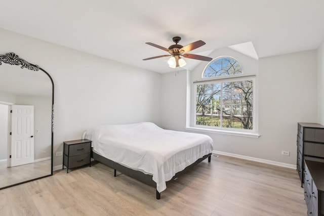 200 Glasgow Ln, Schaumburg, IL 60194 - bedroom featuring light wood-type flooring, vaulted ceiling, and a ceiling fan