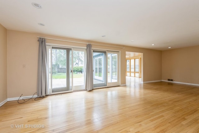 349 Ridge Rd, Kenilworth, IL 60043 - empty room featuring light wood-style flooring, baseboards, visible vents, and recessed lighting