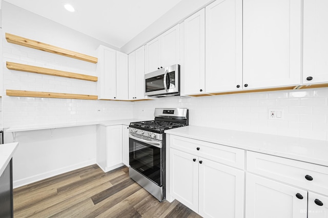 18445 Kedzie Ave, Homewood, IL 60430 - kitchen with stainless steel appliances, white cabinetry, open shelves, light countertops, and wood finished floors
