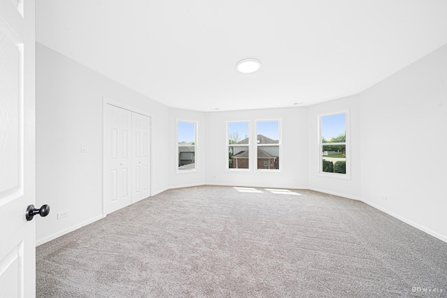 18445 Kedzie Ave, Homewood, IL 60430 - unfurnished bedroom with carpet, multiple windows, and baseboards