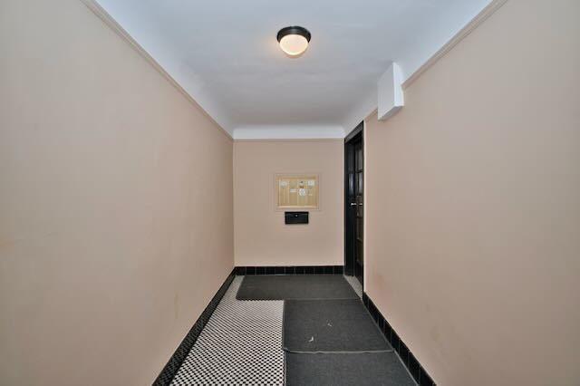 6237 N Mozart St, Chicago, IL 60659 - hallway featuring baseboards