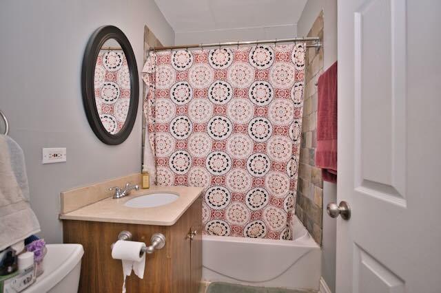 6237 N Mozart St, Chicago, IL 60659 - full bath with toilet, vanity, and shower / bath combination with curtain