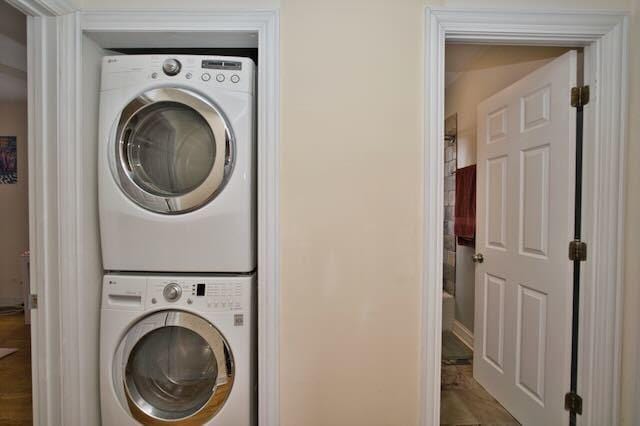 6237 N Mozart St, Chicago, IL 60659 - laundry room featuring stacked washer / dryer and laundry area