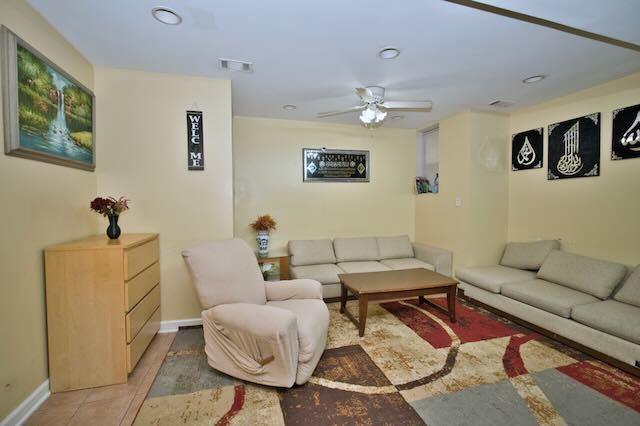6237 N Mozart St, Chicago, IL 60659 - living room featuring recessed lighting, visible vents, baseboards, and ceiling fan