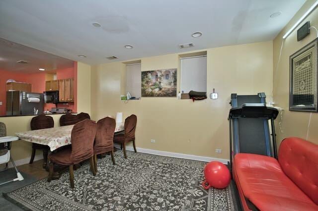 6237 N Mozart St, Chicago, IL 60659 - dining space with recessed lighting, visible vents, and baseboards