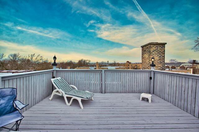 6237 N Mozart St, Chicago, IL 60659 - view of deck at dusk