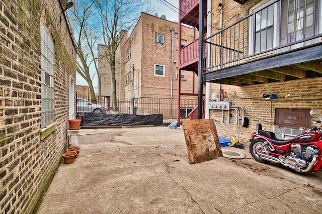 6237 N Mozart St, Chicago, IL 60659 - view of patio / terrace featuring fence