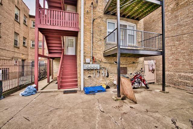 6237 N Mozart St, Chicago, IL 60659 - exterior space featuring brick siding