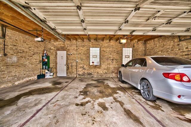 6237 N Mozart St, Chicago, IL 60659 - garage with a garage door opener