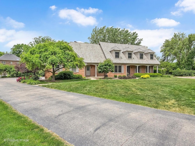2 Stirrup Cup Ct, Saint Charles, IL 60174 - new england style home featuring brick siding and a front lawn