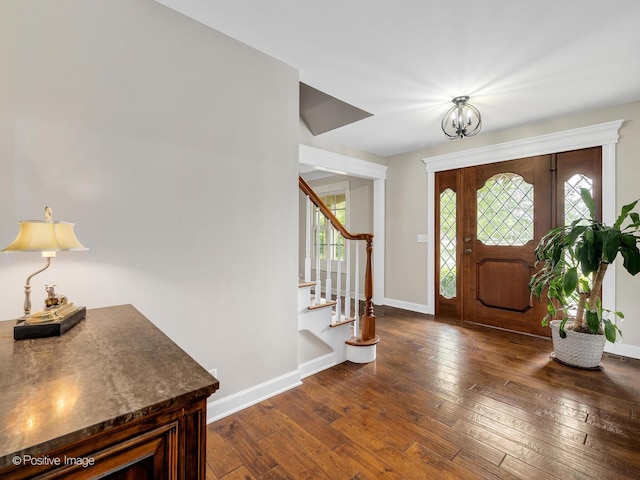 2 Stirrup Cup Ct, Saint Charles, IL 60174 - foyer entrance featuring a chandelier, hardwood / wood-style flooring, baseboards, and stairs
