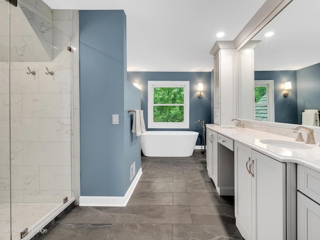2 Stirrup Cup Ct, Saint Charles, IL 60174 - full bath featuring double vanity, a shower stall, a freestanding tub, baseboards, and recessed lighting