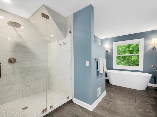 2 Stirrup Cup Ct, Saint Charles, IL 60174 - bathroom with a shower stall, baseboards, and a freestanding bath