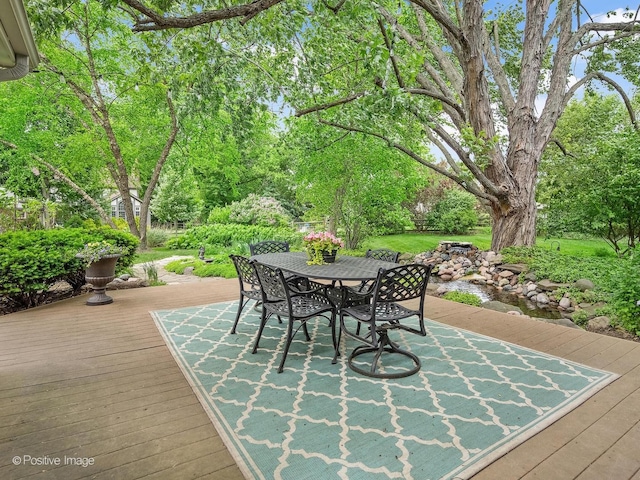 2 Stirrup Cup Ct, Saint Charles, IL 60174 - view of patio / terrace with a deck, outdoor dining space, and view of scattered trees