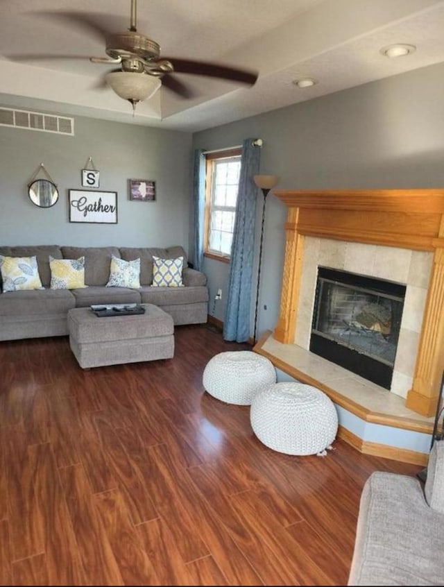 175 Mulberry St, Manteno, IL 60950 - living room featuring wood finished floors, a fireplace, and a ceiling fan
