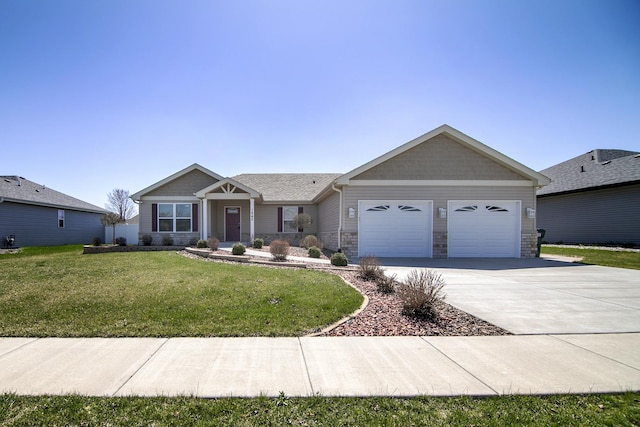 view of front facade featuring an attached garage, concrete driveway, stone siding, and a front lawn