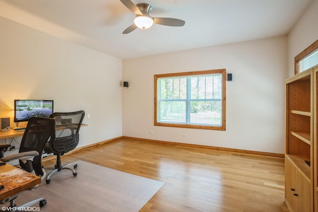 905 Basswood St, Hoffman Estates, IL 60169 - home office featuring plenty of natural light, wood finished floors, a ceiling fan, and baseboards
