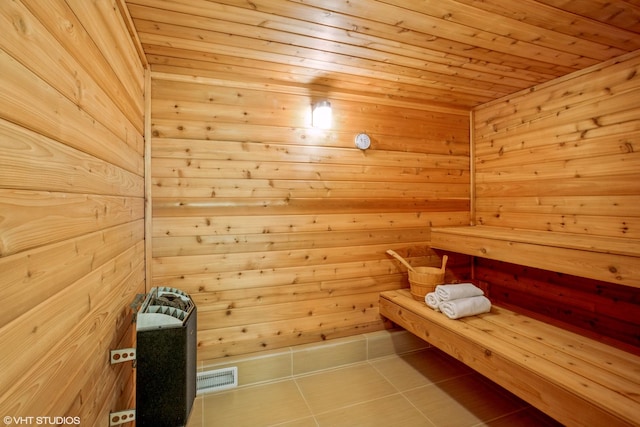 905 Basswood St, Hoffman Estates, IL 60169 - relaxing sauna with tile patterned flooring, wood ceiling, and wooden walls