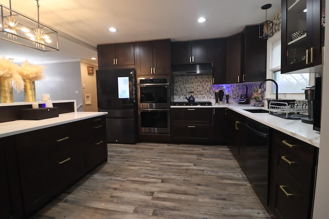 20301 Fairfield Ave, Olympia Fields, IL 60461 - kitchen with a sink, dark wood-type flooring, black appliances, under cabinet range hood, and tasteful backsplash