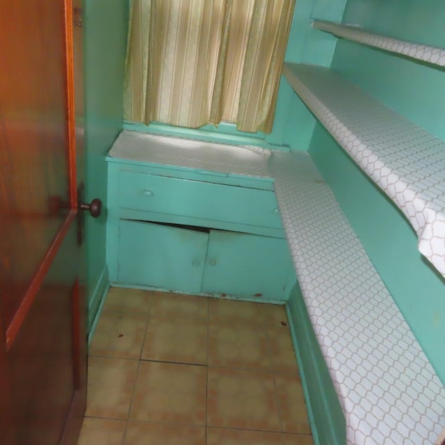 4938 W Wrightwood Ave, Chicago, IL 60639 - bathroom with tile patterned floors