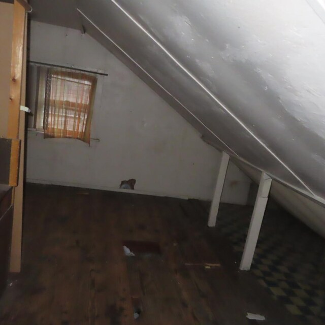 4938 W Wrightwood Ave, Chicago, IL 60639 - additional living space with wood finished floors and vaulted ceiling