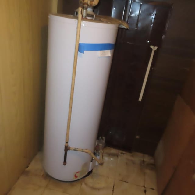 4938 W Wrightwood Ave, Chicago, IL 60639 - utility room featuring water heater