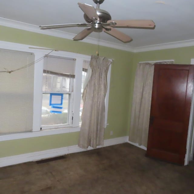 4938 W Wrightwood Ave, Chicago, IL 60639 - empty room featuring baseboards, crown molding, and ceiling fan