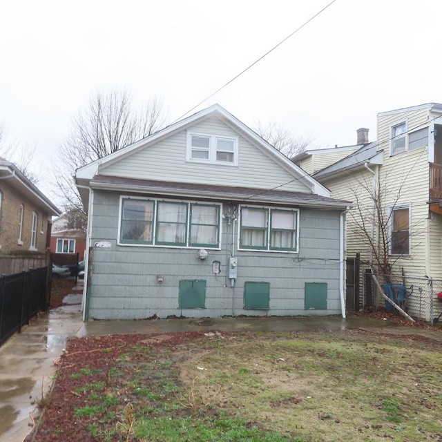 4938 W Wrightwood Ave, Chicago, IL 60639 - rear view of house with fence