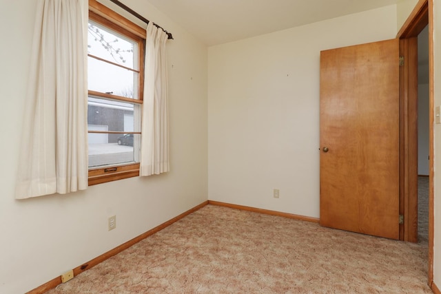 108 N Chatham St, Danvers, IL 61732 - carpeted spare room featuring baseboards