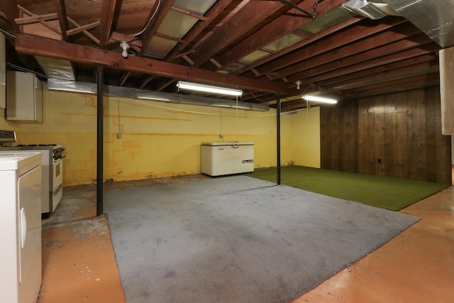 108 N Chatham St, Danvers, IL 61732 - unfinished below grade area featuring refrigerator and separate washer and dryer