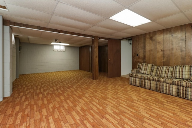 108 N Chatham St, Danvers, IL 61732 - finished basement with wood finished floors, concrete block wall, and a drop ceiling