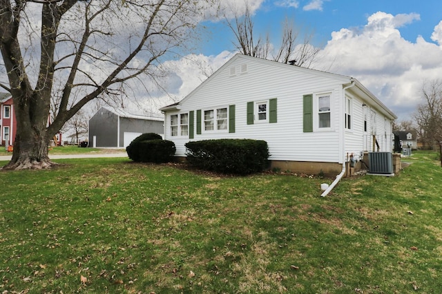 108 N Chatham St, Danvers, IL 61732 - view of side of home featuring central AC unit and a lawn