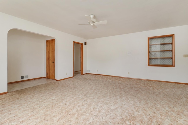 108 N Chatham St, Danvers, IL 61732 - carpeted spare room featuring baseboards, ceiling fan, and visible vents