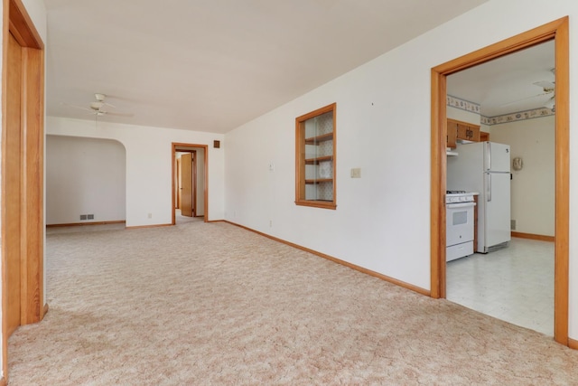 108 N Chatham St, Danvers, IL 61732 - spare room featuring carpet flooring, visible vents, baseboards, and ceiling fan