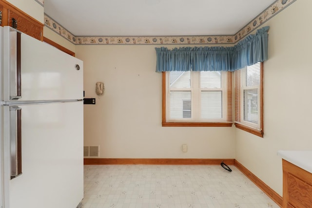 108 N Chatham St, Danvers, IL 61732 - unfurnished room featuring visible vents, baseboards, and light floors