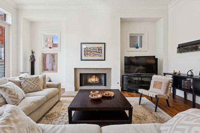 2735 N Dayton St, Chicago, IL 60614 - living area with ornamental molding, wood finished floors, and a warm lit fireplace
