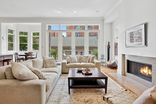 2735 N Dayton St, Chicago, IL 60614 - living room featuring a premium fireplace, light wood finished floors, ornamental molding, and recessed lighting