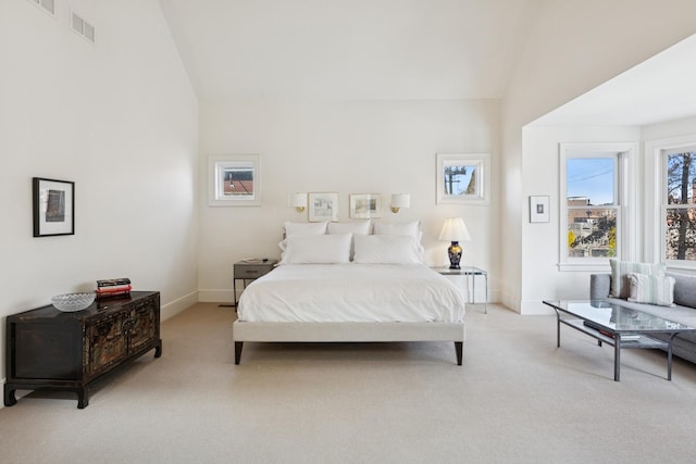 2735 N Dayton St, Chicago, IL 60614 - bedroom with light carpet, baseboards, and high vaulted ceiling