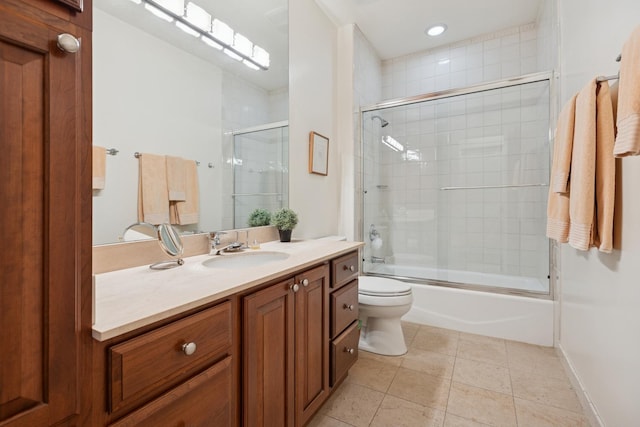 2735 N Dayton St, Chicago, IL 60614 - bathroom featuring tile patterned floors, toilet, vanity, bath / shower combo with glass door, and recessed lighting