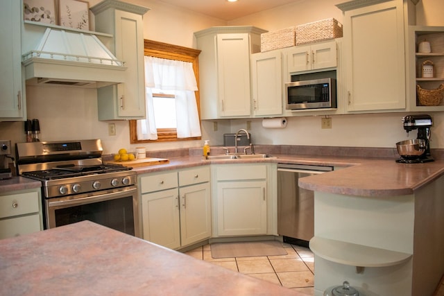 447 S State St, Monticello, IL 61856 - kitchen featuring light tile patterned floors, open shelves, appliances with stainless steel finishes, a sink, and premium range hood