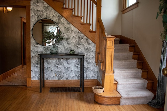 447 S State St, Monticello, IL 61856 - stairs featuring wood-type flooring and baseboards