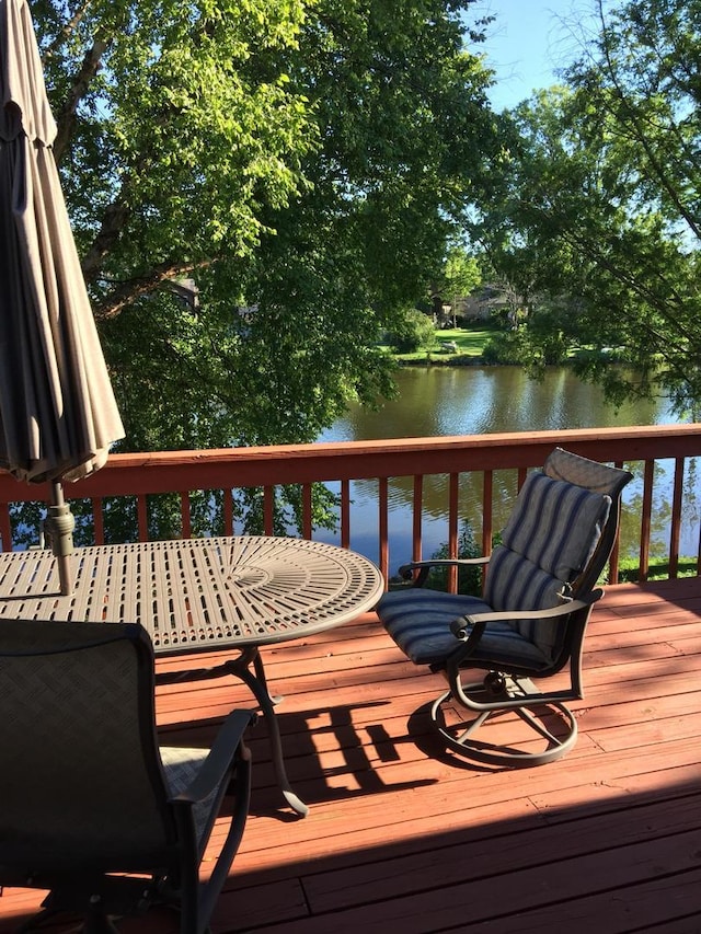 187 Hilltop Dr, Lake In The Hills, IL 60156 - wooden terrace featuring a water view and outdoor dining area