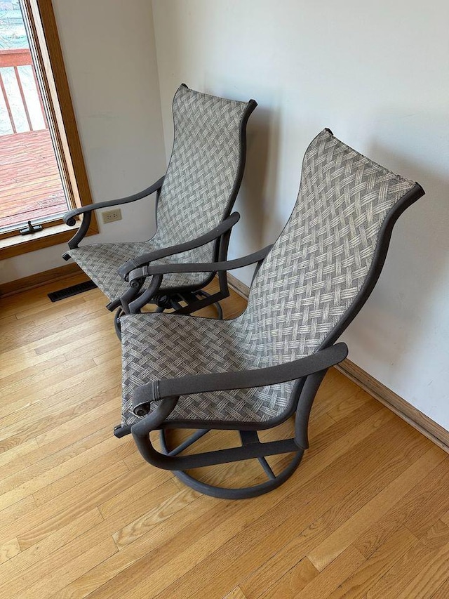 187 Hilltop Dr, Lake In The Hills, IL 60156 - sitting room with wood finished floors and baseboards