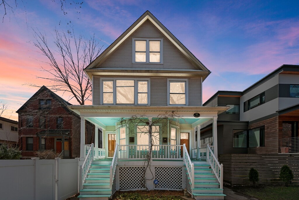 6070 N Hermitage Ave, Chicago, IL 60660 - view of front of property featuring stairway and covered porch
