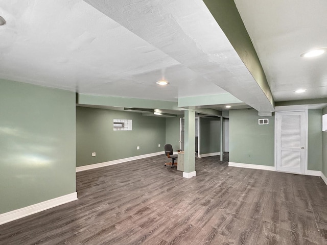 608 W 107th St, Chicago, IL 60628 - finished below grade area with wood finished floors, recessed lighting, and baseboards