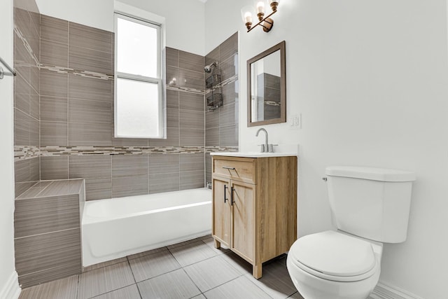 bathroom featuring toilet, vanity, and washtub / shower combination